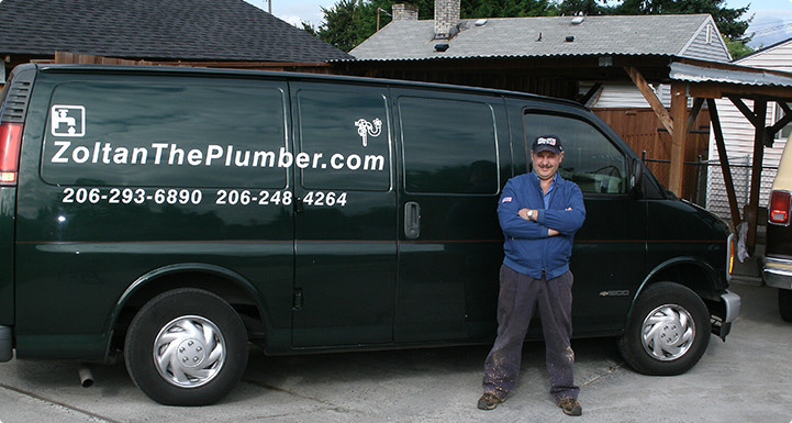 Zoltan standing in front of his green ZoltanThePlumber.com service van